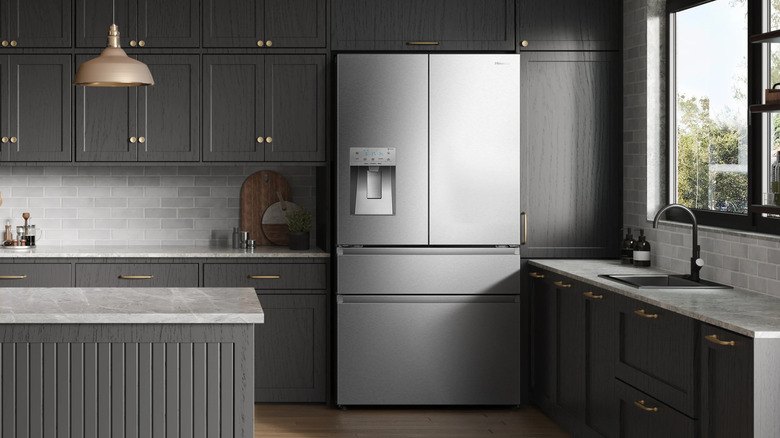 A Hisense French-door refrigerator in a gray-themed modern kitchen