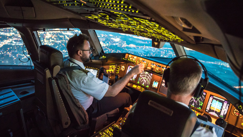 Pilots in-flight in the cockpit of a commercial airliner