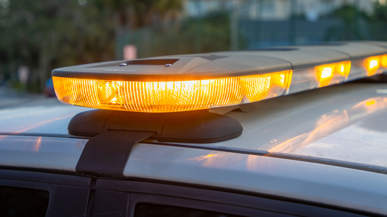 Light bar with yellow lights on top of a vehicle