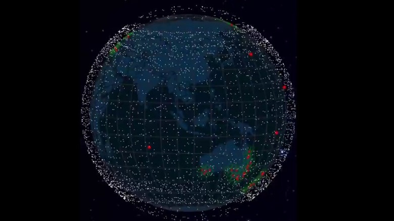 Graphic of Earth surrounded by Starlink satellites