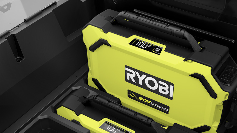 Ryobi 80V Battery being installed into Zero Turn mower