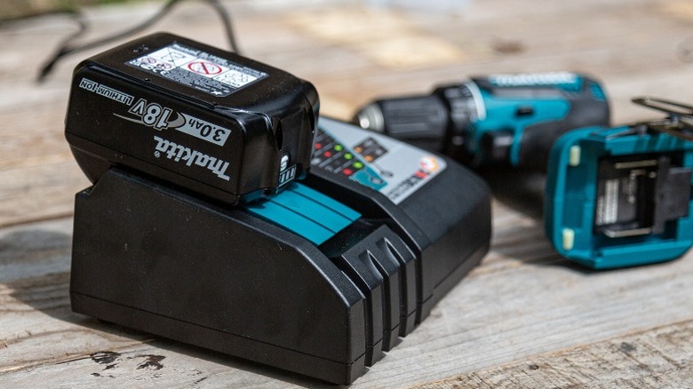 Makita battery charger sitting on table