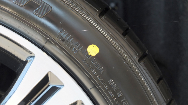 A Yellow Dot On A Tire