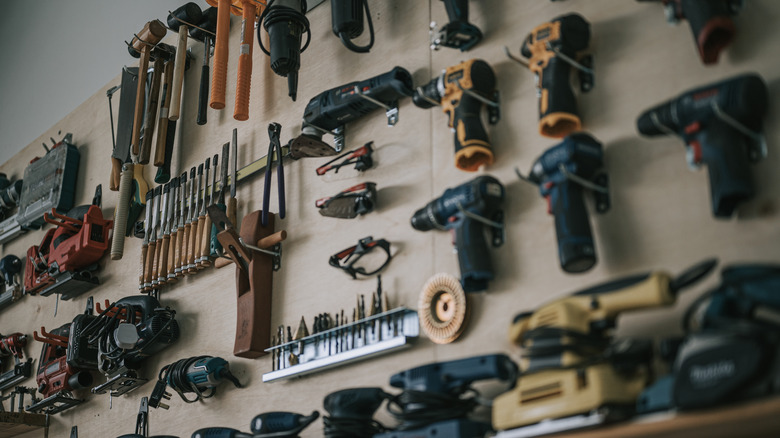 Power tools on a wall