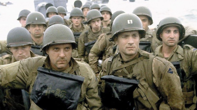 Tom Hanks is at the forefront as soldiers of 2nd Ranger Battalion making landfall in a Higgins craft at Omaha Beach during the Normandy Invasion in the movie 