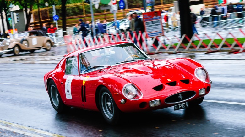 Ferrari 250 GTO driving on road