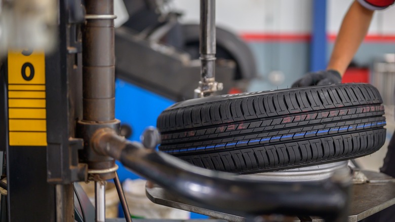 Mechanic changing a car tire