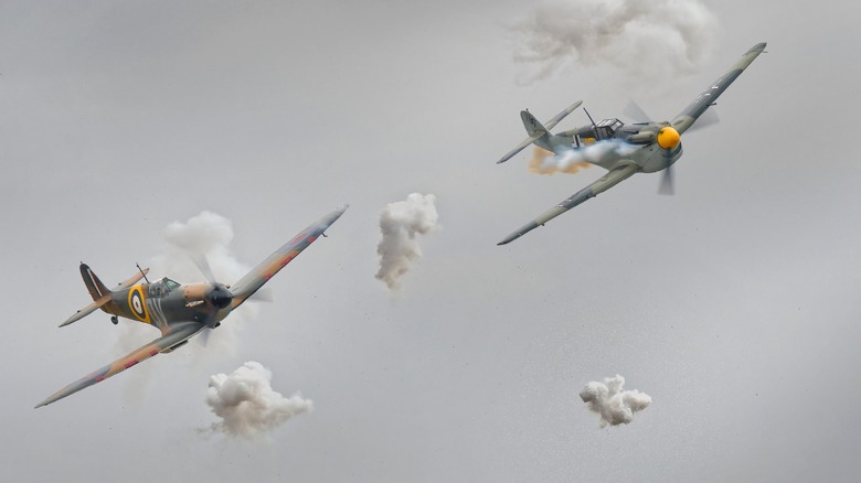 RAF Spitfire and Luftwaffe BF-109 fighter planes flying