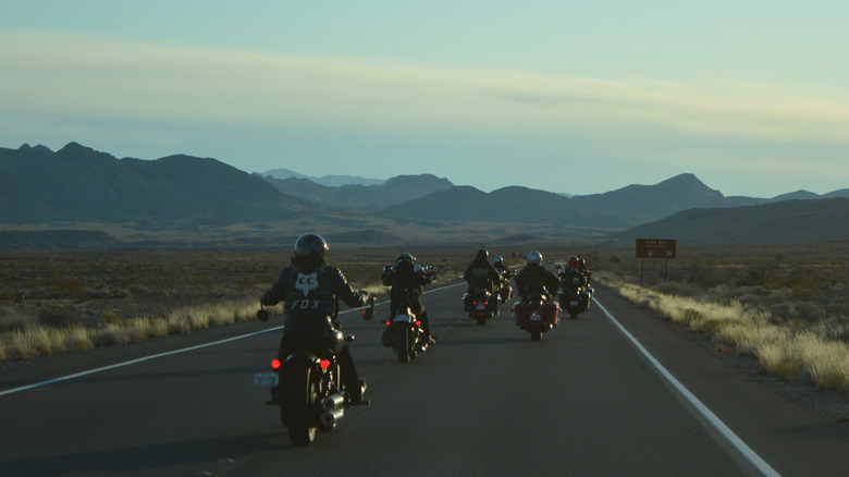 Motorcycle group on desert road