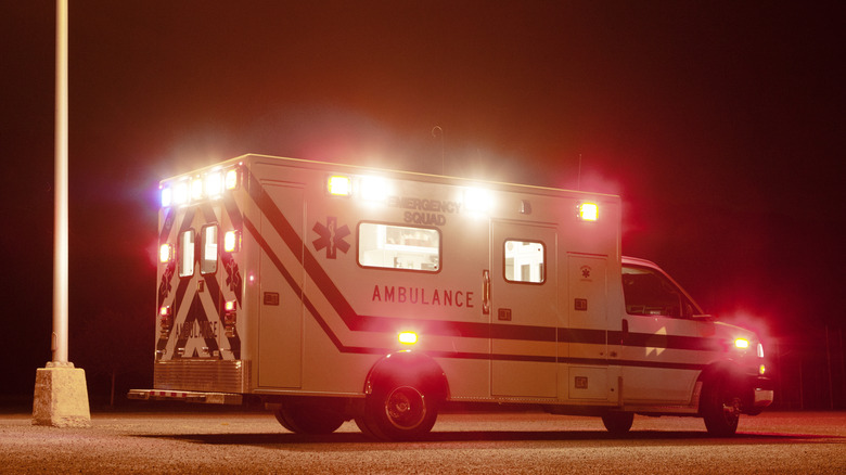 Ambulance with lights on at night