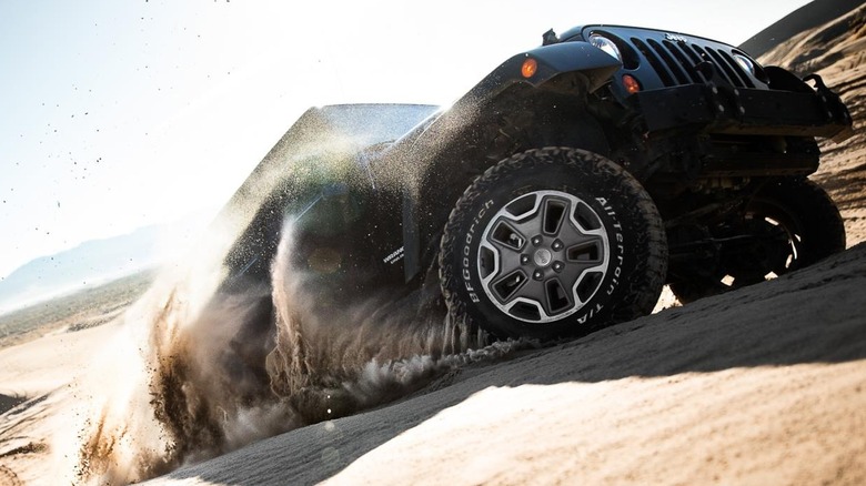 Jeep driving sand dunes with BFGoodrich tires