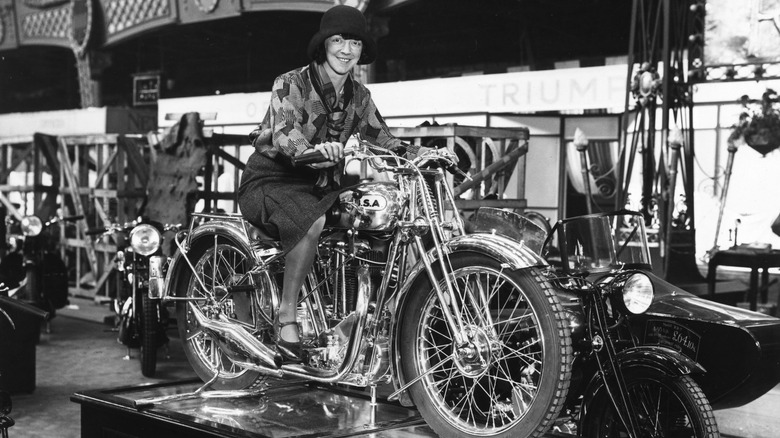 Woman sitting on BSA Motorcycle