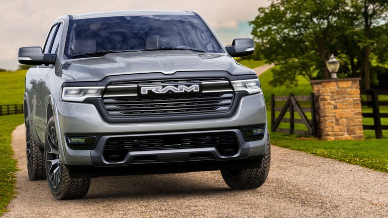 RAM 1500 Ramcharger going up gravel driveway