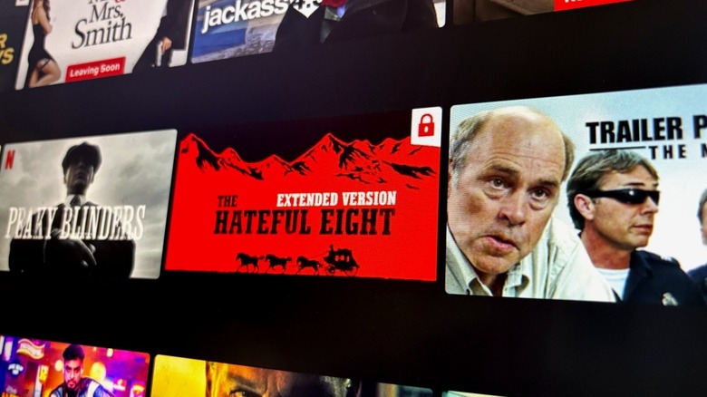 A lock icon appears on a Netflix movie title