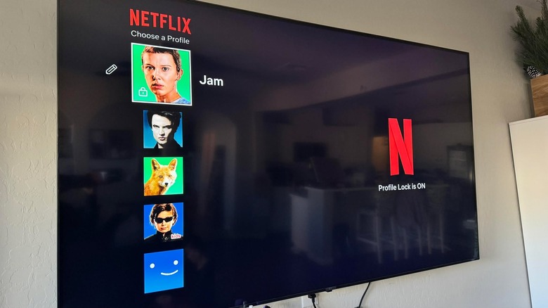 A lock icon appears on a Netflix profile