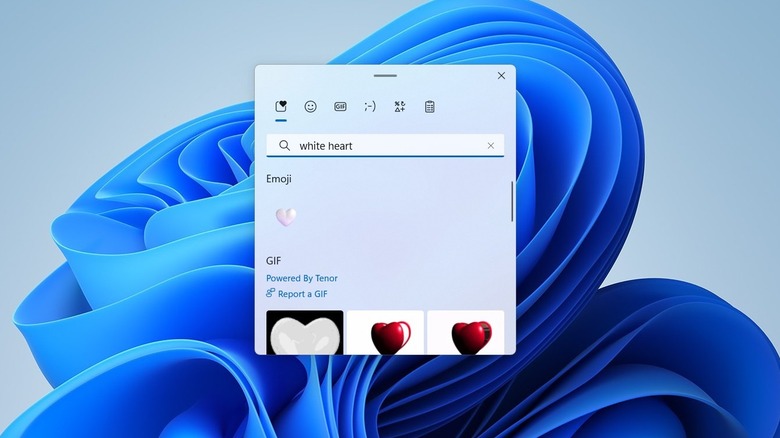 White heart emoji on a Windows 11 laptop.