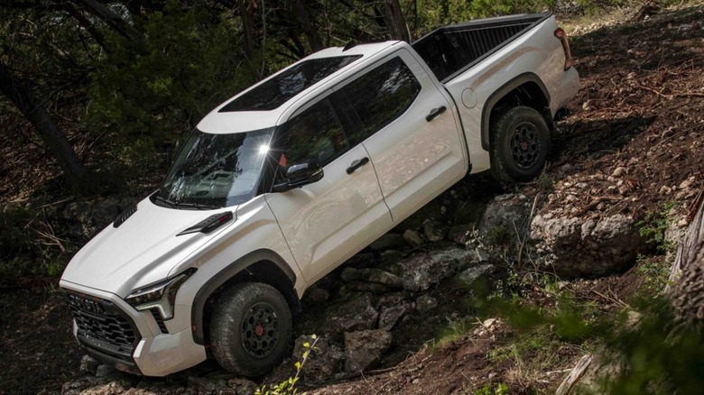 The 2025 Toyota Tundra TRD Pro negotiating a rocky trail.