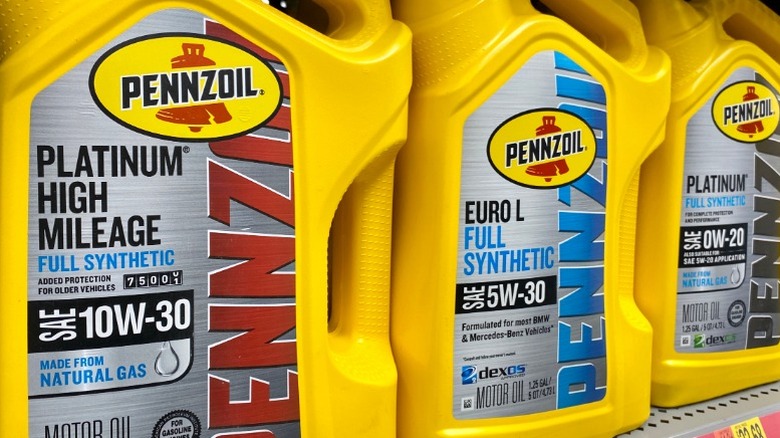 several pennzoil engine oil bottles in different viscosities