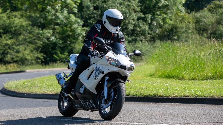 Person riding Yamaha YZF-R6 on the road