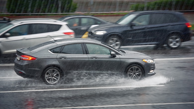 Cars driving in the rain