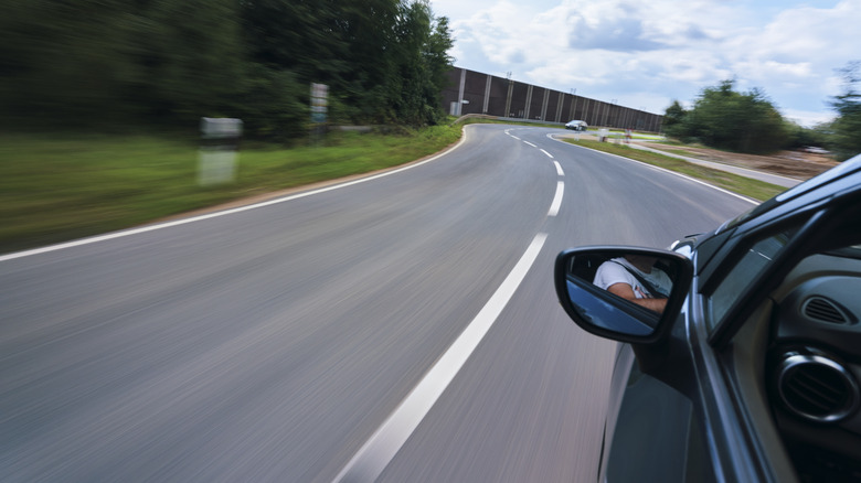 Fast car on country road