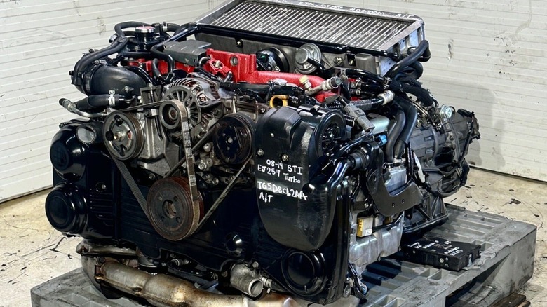 A Subaru EJ257 engine from Japan sitting on a pallet