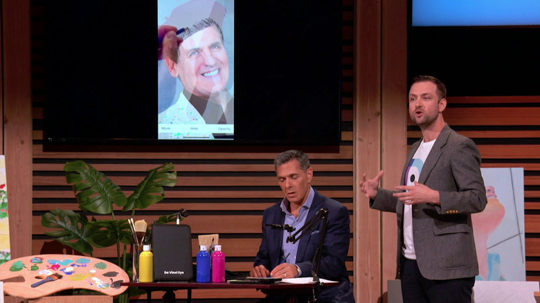 Da Vinci Eye founder Samuel Gherman and shark Daniel Lubetzky on the "Shark Tank" stage showing off how the app works.