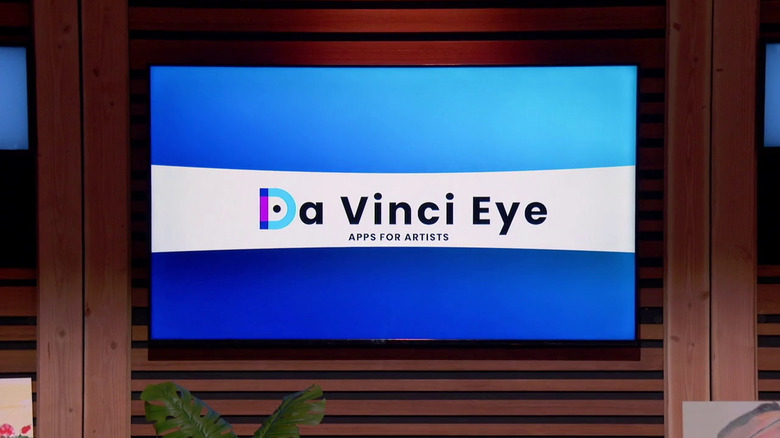 The Da Vinci Eye logo on TV during the "Shark Tank" presentation