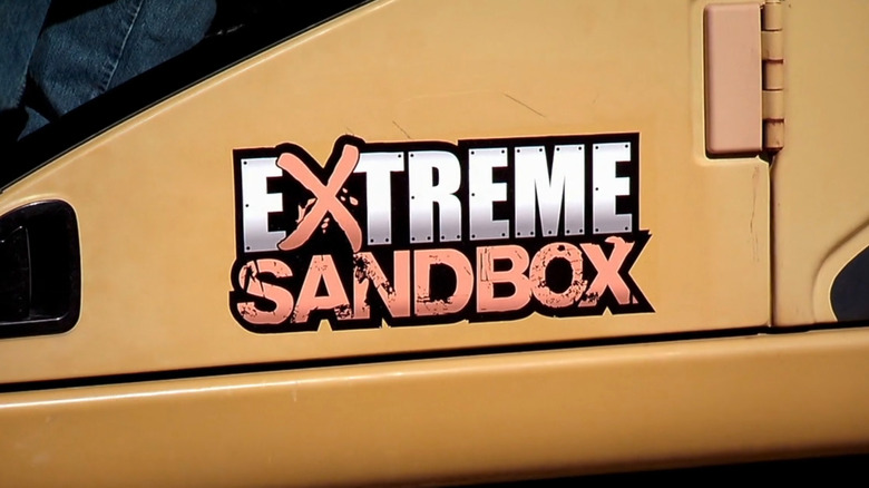 Extreme Sandbox logo on side of machine