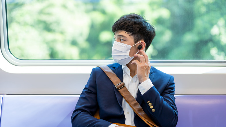 Man wearing earbuds