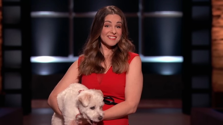 Kirsten Brand holding dog