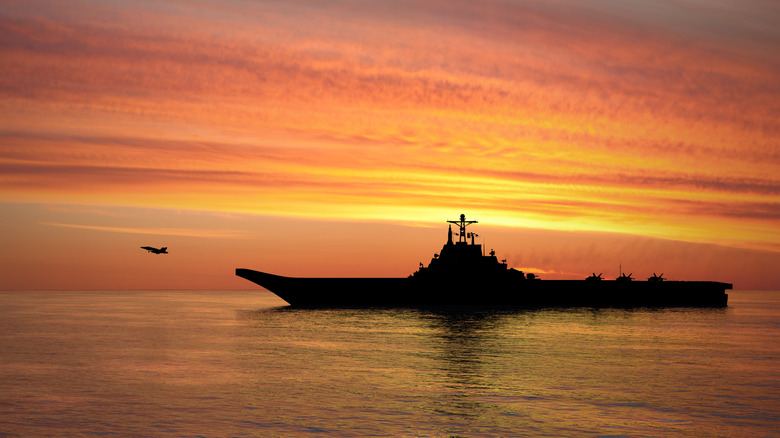 Kuznetsov aircraft carrier at sunset