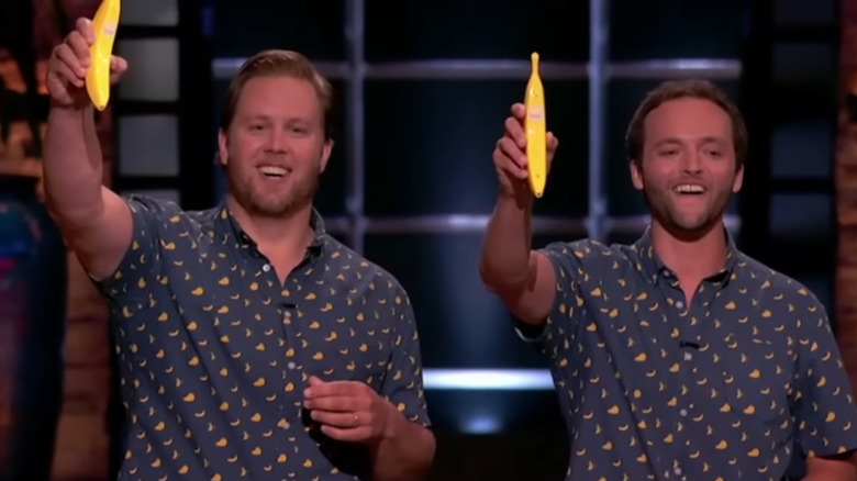 Two men hold Banana Phones