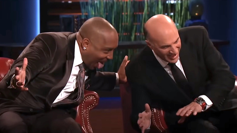 Daymond John and Kevin O'Leary posing for Cycloramic pics on Shark Tank