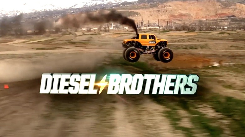 A driver jumping the Diesel Brothers' famed Brodozer monster truck.