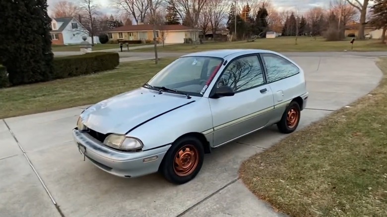 1995 Ford Aspire in driveway