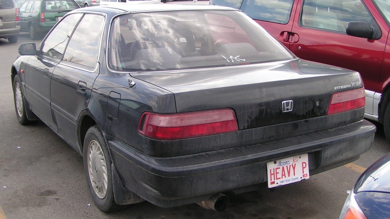 Black Honda Integra SXi sedan