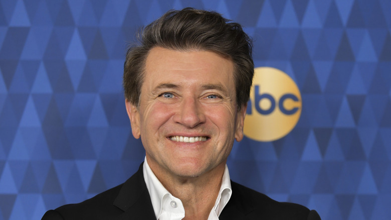 Robert Herjavec smiling on the red carpet