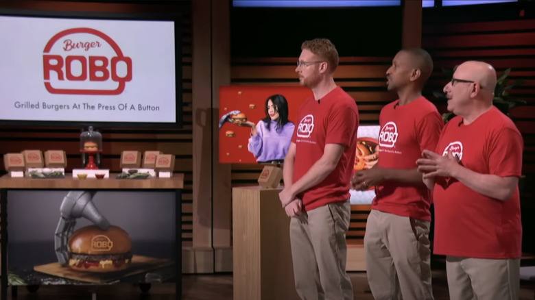 Dan Braido, Audley Wilson, and Andy Siegel presenting their product on the Shark Tank set