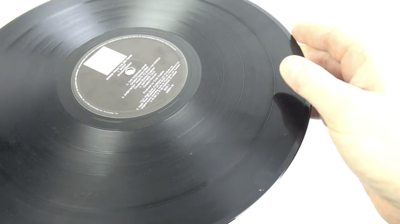 vinyl record with visible ring of damage caused by Rokblok