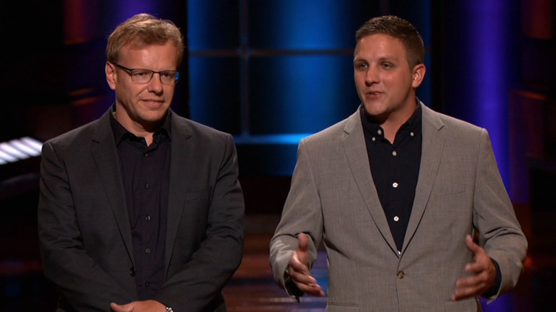 Jamie talking next to Dean on Shark Tank