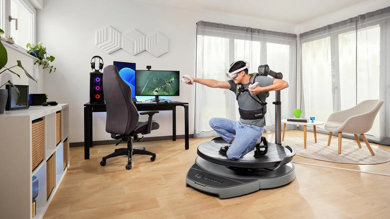 Man using the Virtuix Omni One to play VR games at home