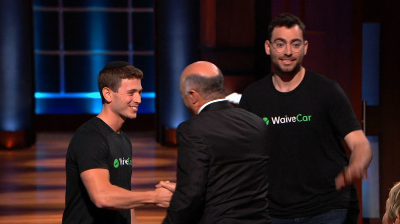 WaiveCar founders and Kevin O'Leary shake on their deal on the set of "Shark Tank"