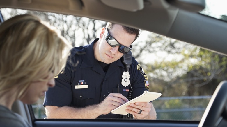 A cop giving out a ticket