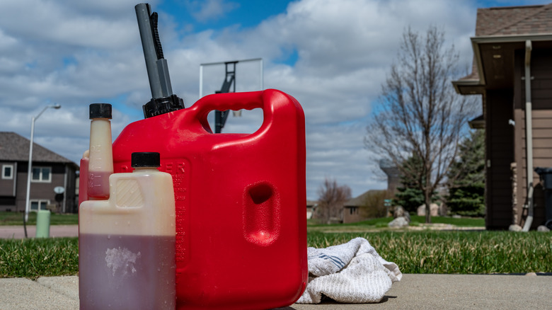 Gas can and fuel stabilizer containers