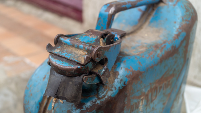 Close up of old and rusty gasoline can nozzle