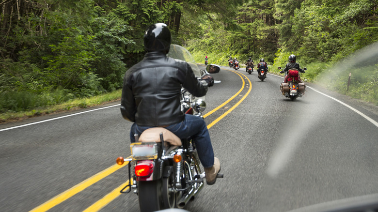 Motorcycle riders on the road.