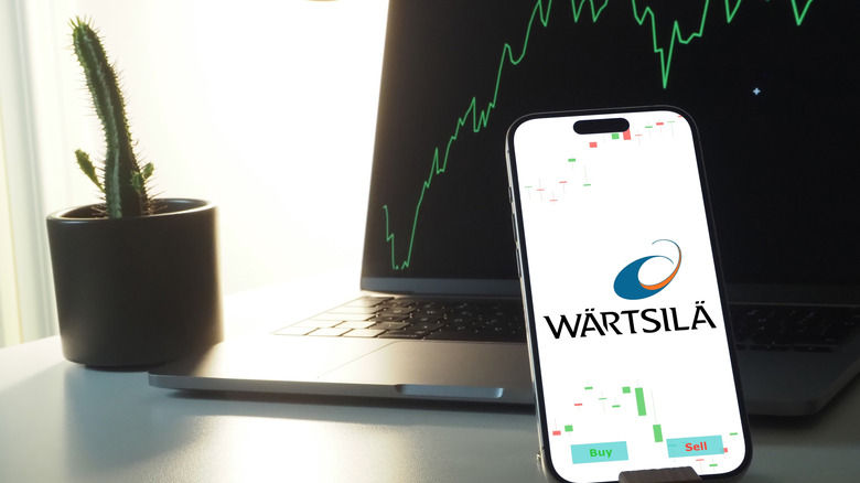 Wärtsilä logo on smartphone in office