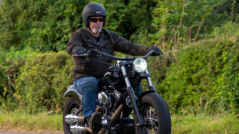 Man on cruiser motorcycle during drive