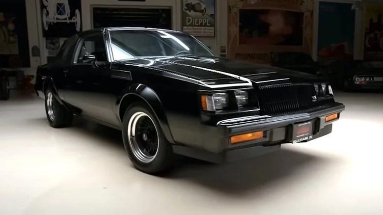 Front 3/4 shot of a black Buick GNX parked in garage